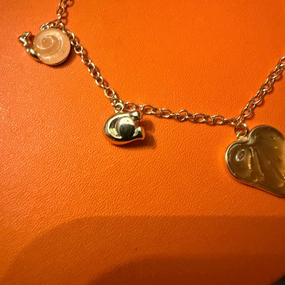 Coach Gold creature multi Charm Bracelet with Amber Heart & White Cat Charm - Picture 3 of 10